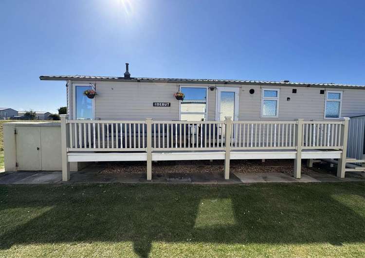 67004M⭐ – M area, 2 bed, 6 berth caravan with side decking. Emerald rated. Preview 0