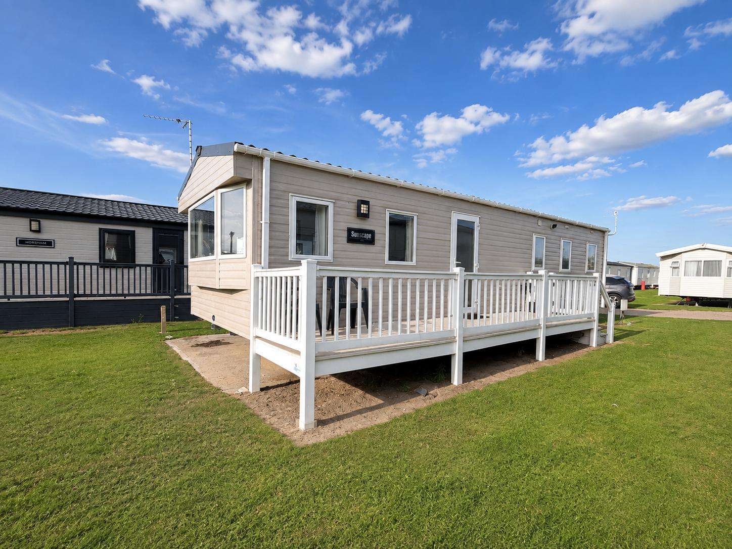 Relax in this 8 berth caravan on Broadland Sands Holiday Park, the family will love their time here. - property