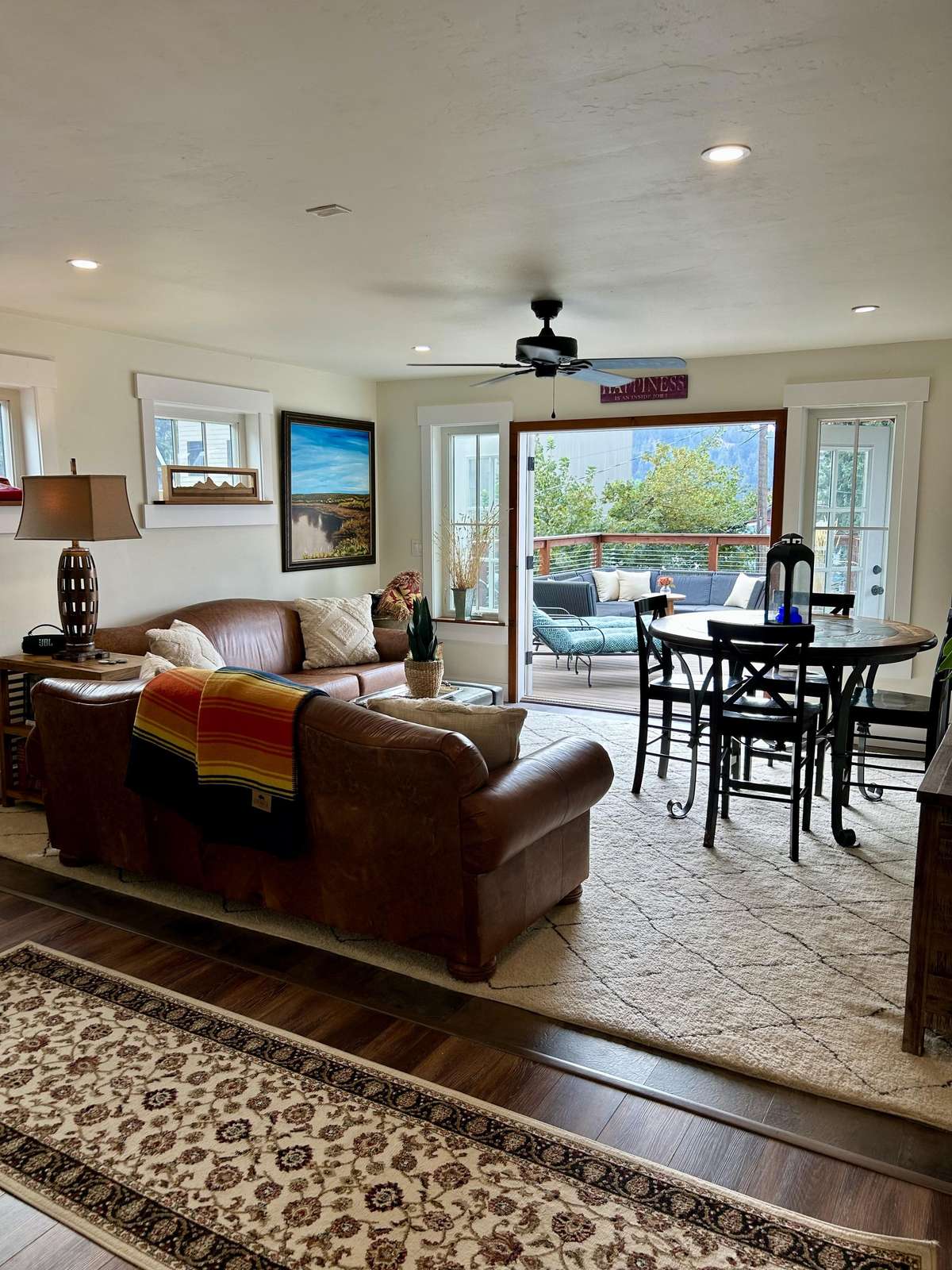 Cozy living and dining area with scenic outdoor views