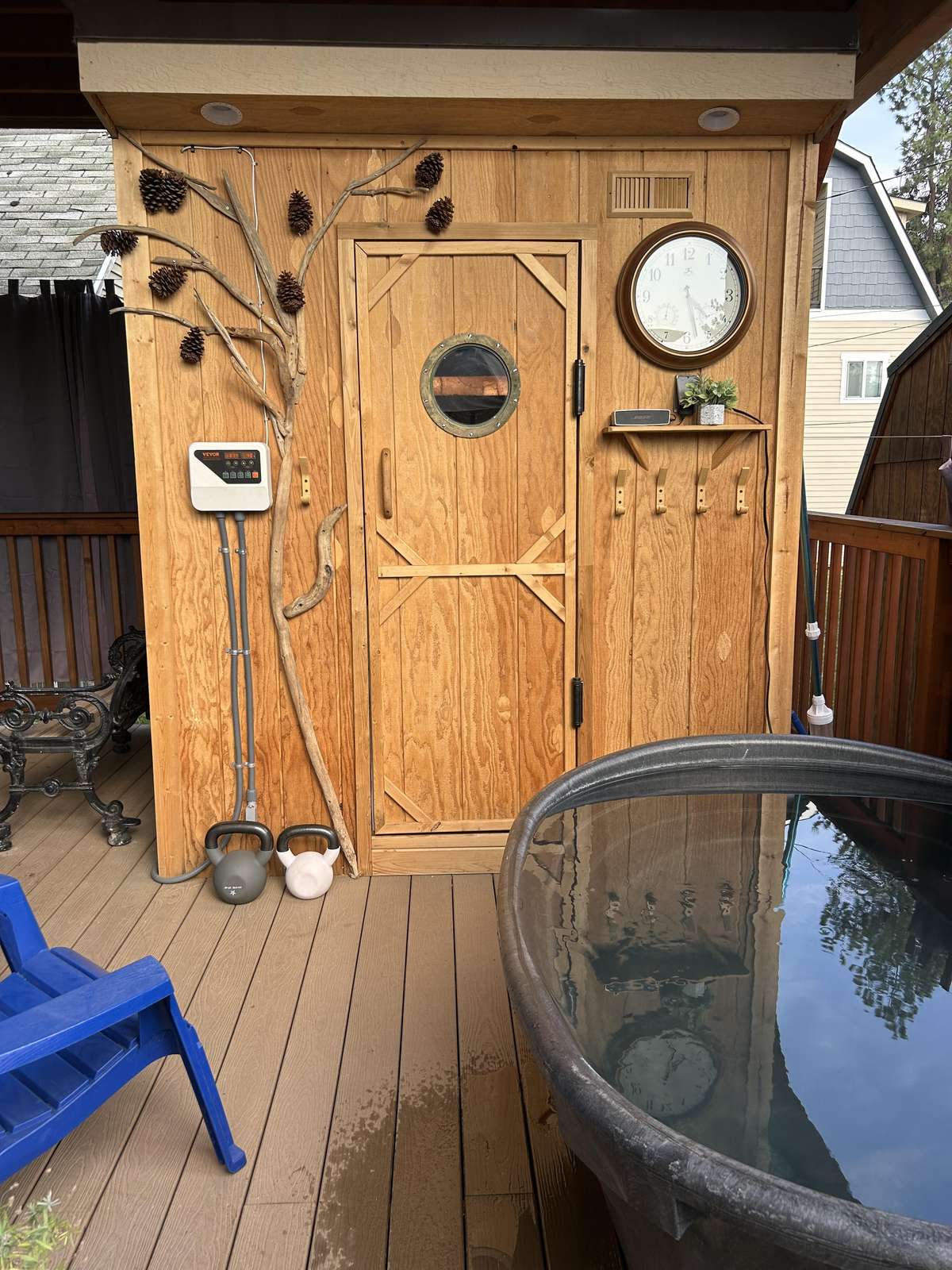 Cozy outdoor deck with sauna and rustic charm