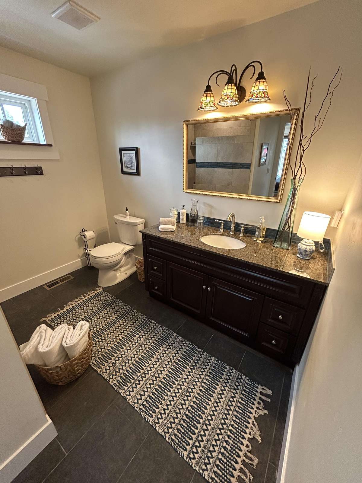 Modern bathroom retreat with elegant vanity and soft lighting
