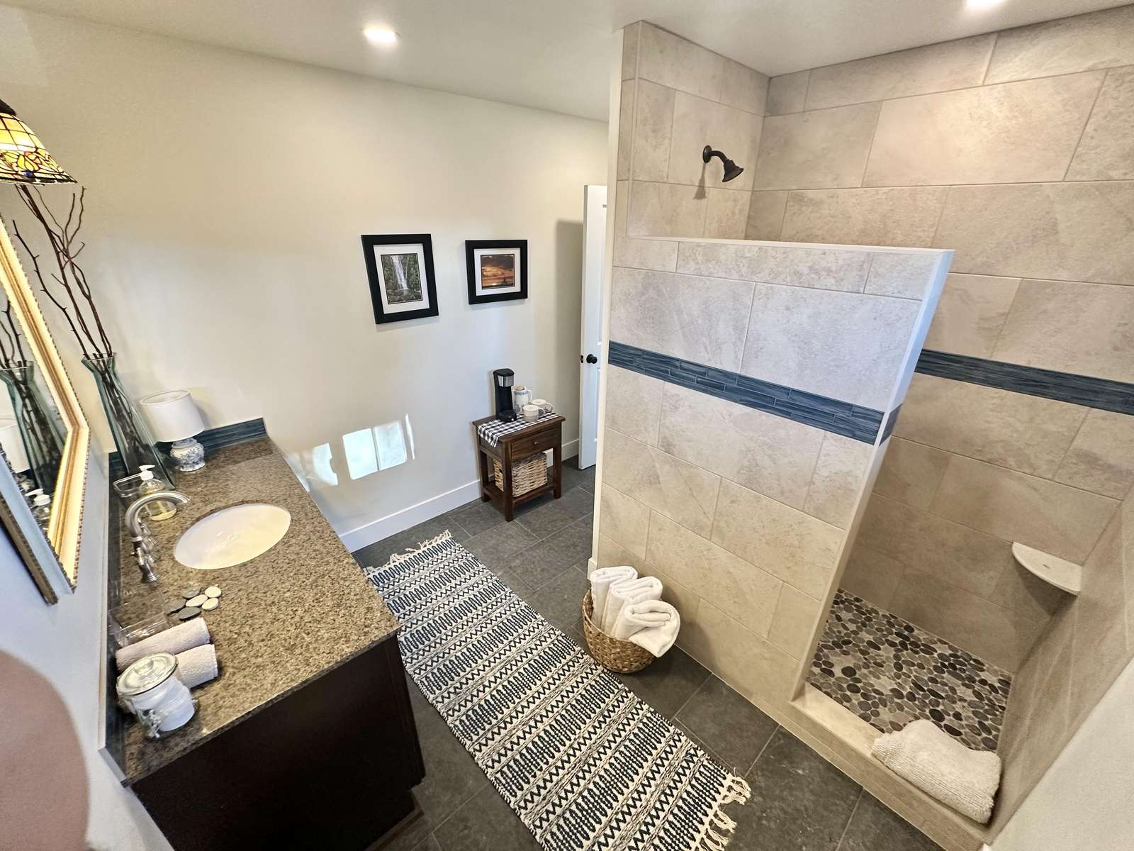 Spa-inspired bathroom with dual sinks and walk-in shower