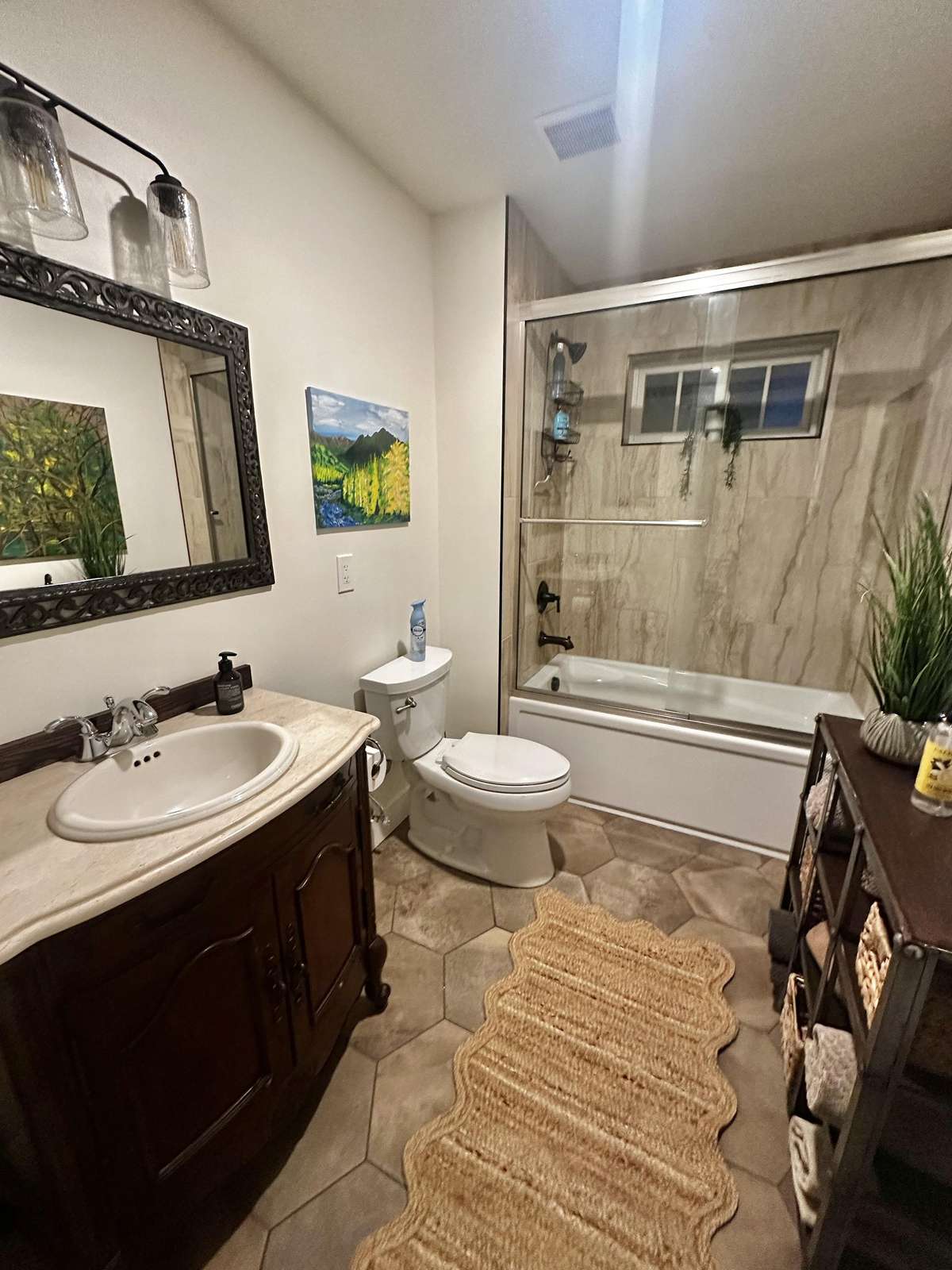 Charming bathroom with elegant vanity and natural light