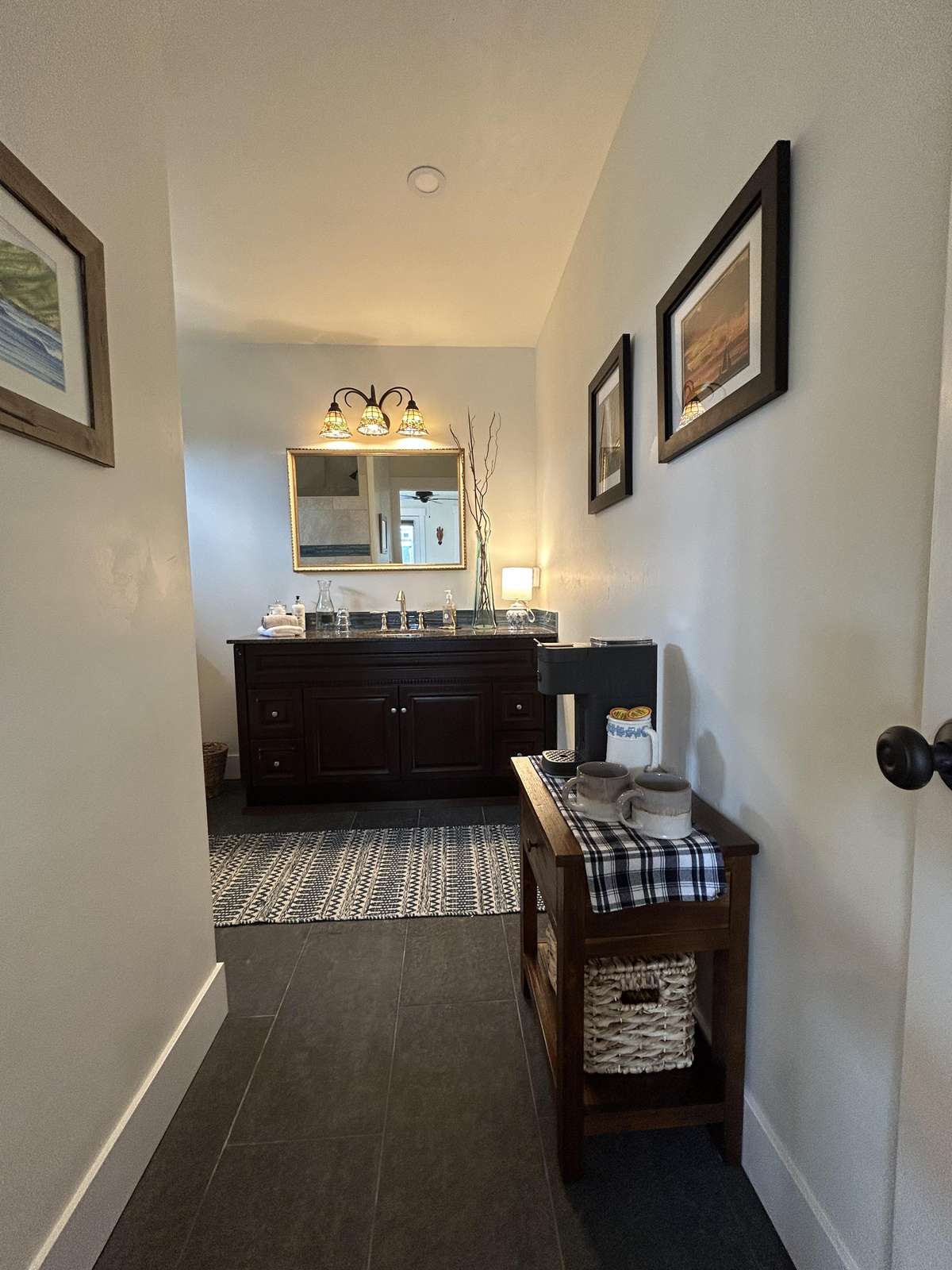 Cozy entryway leading to a modern, open kitchen space