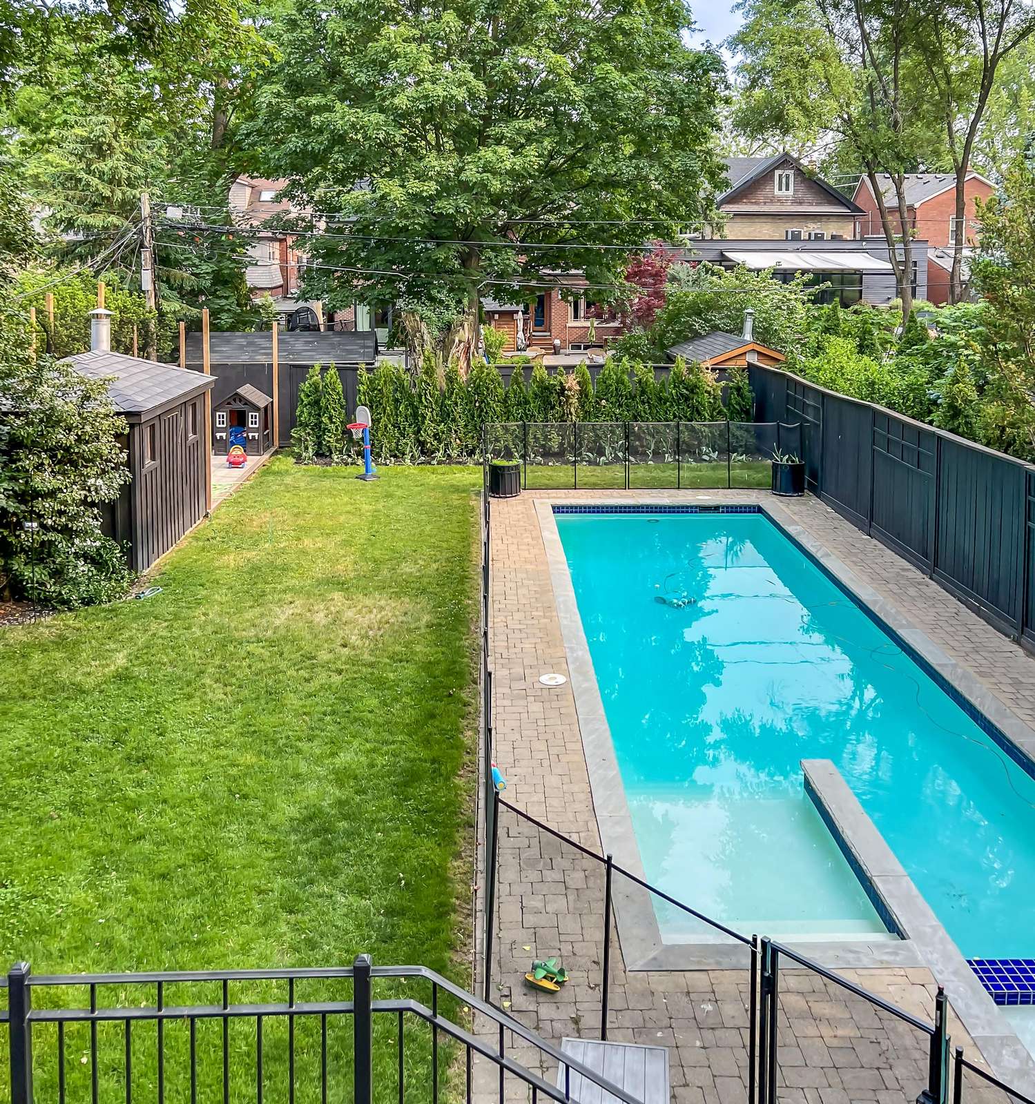 Private fenced pool and spacious backyard for family fun