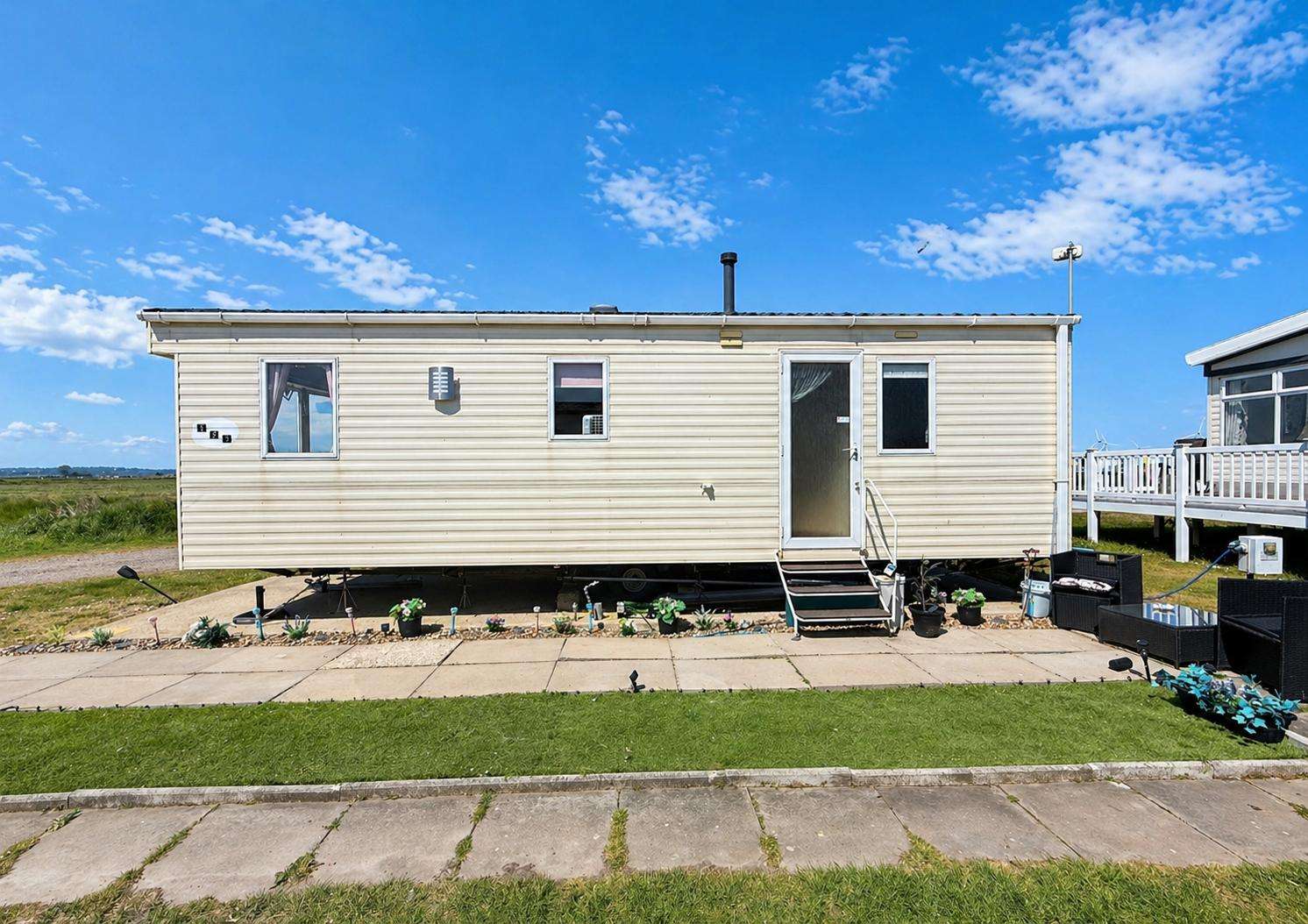 Camber Sands, is the perfect destination for family holidays 2026, offering dog-friendly weekend breaks and caravan holidays UK with options like a caravan with decking for added comfort. - property