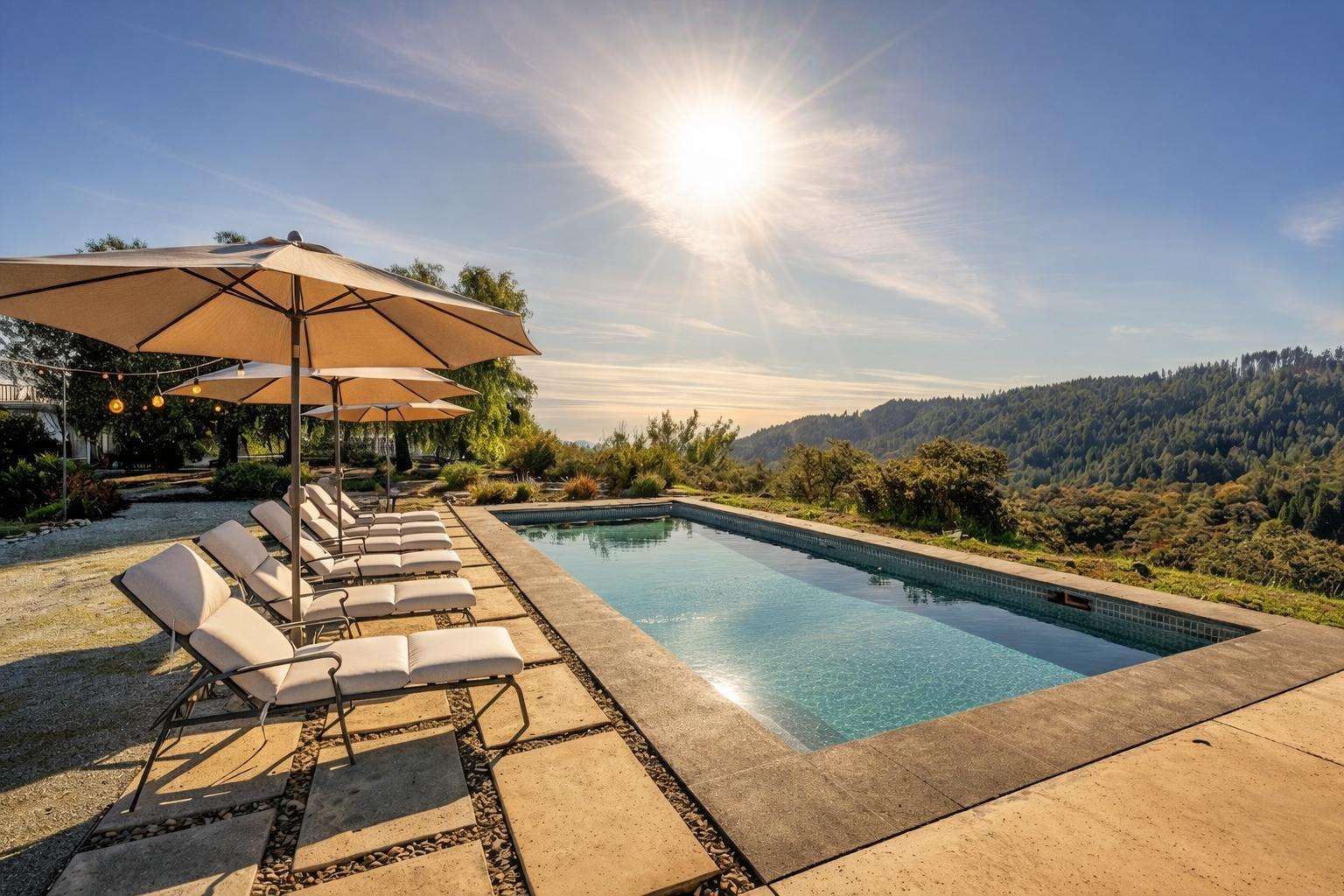 Sun-drenched poolside retreat with stunning mountain views - property