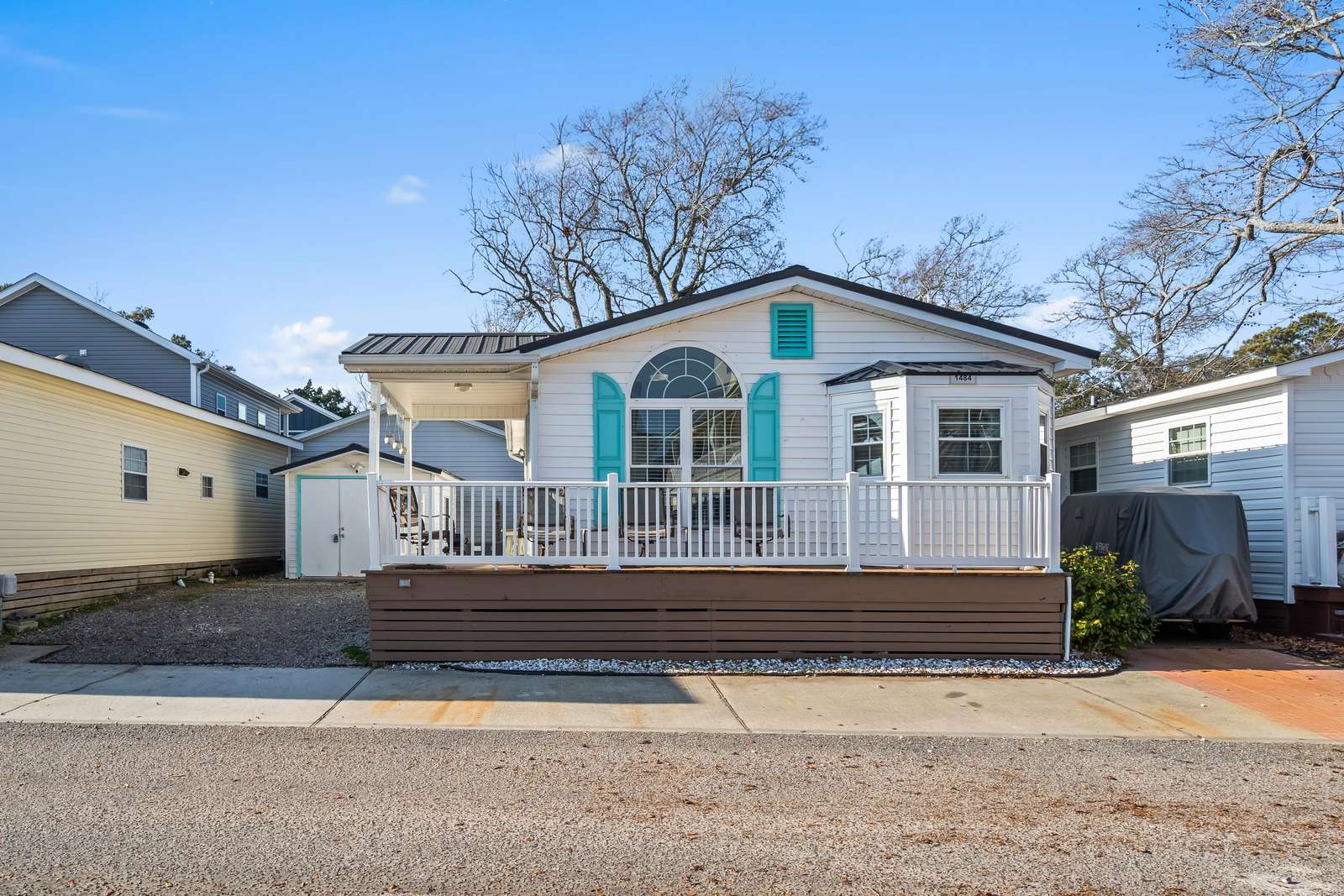 Charming front porch perfect for morning coffee and sunsets - property