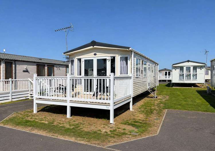 27015HV⭐ – HV, 2 bed, 6 berth caravan with front decking, D/G and C/H. Ruby rated. Preview 0