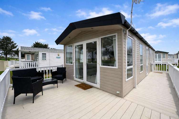 22044G⛱️ – Gannet area, 3 bed, 8 berth caravan with wrap-around decking. Diamond rated. Preview 0