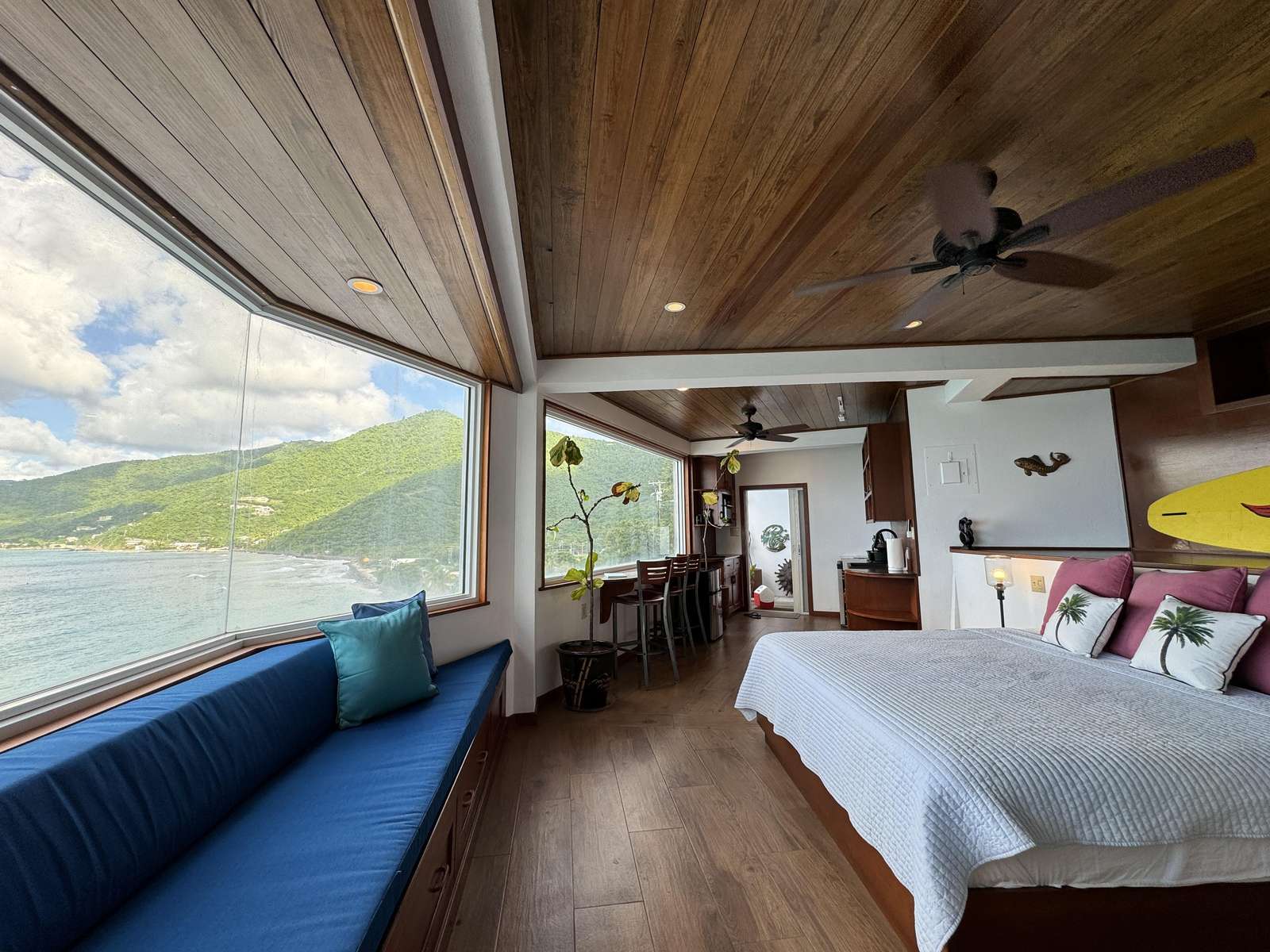 Spacious bedroom with panoramic lake and mountain views - property