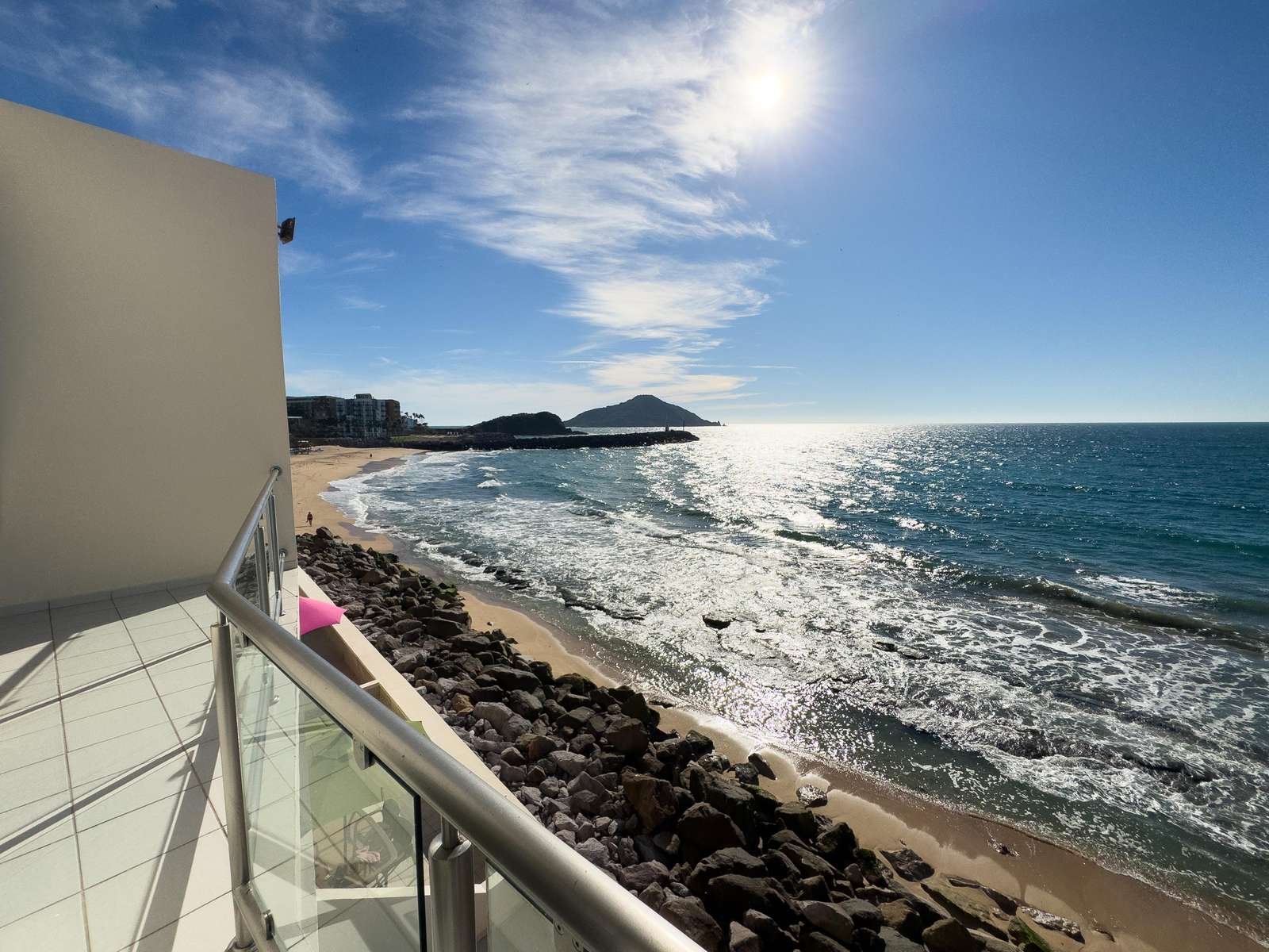 Oceanfront balcony with stunning sunrise and sea views - property
