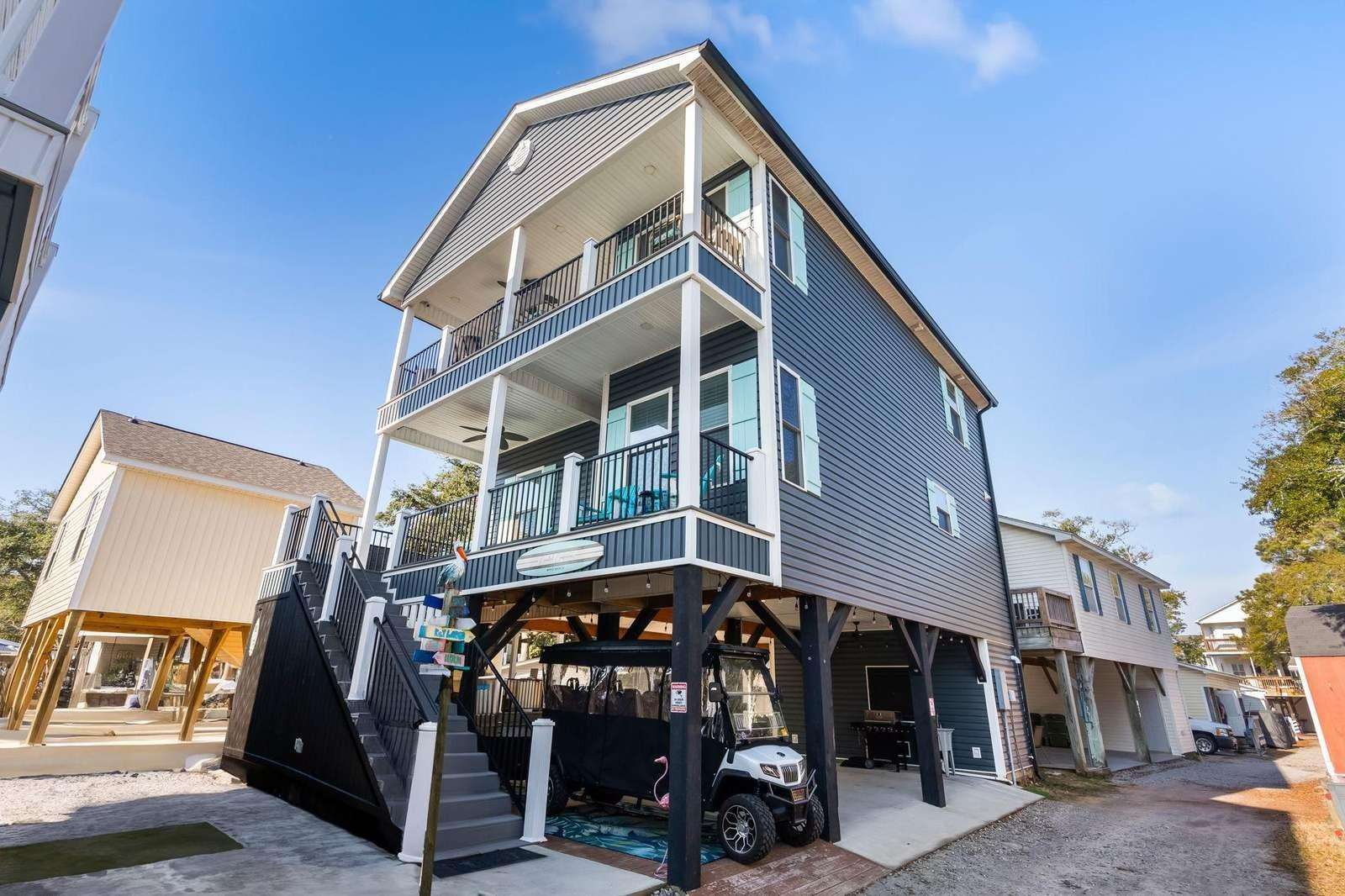 Spacious three-story home with multiple balconies for relaxing views - property