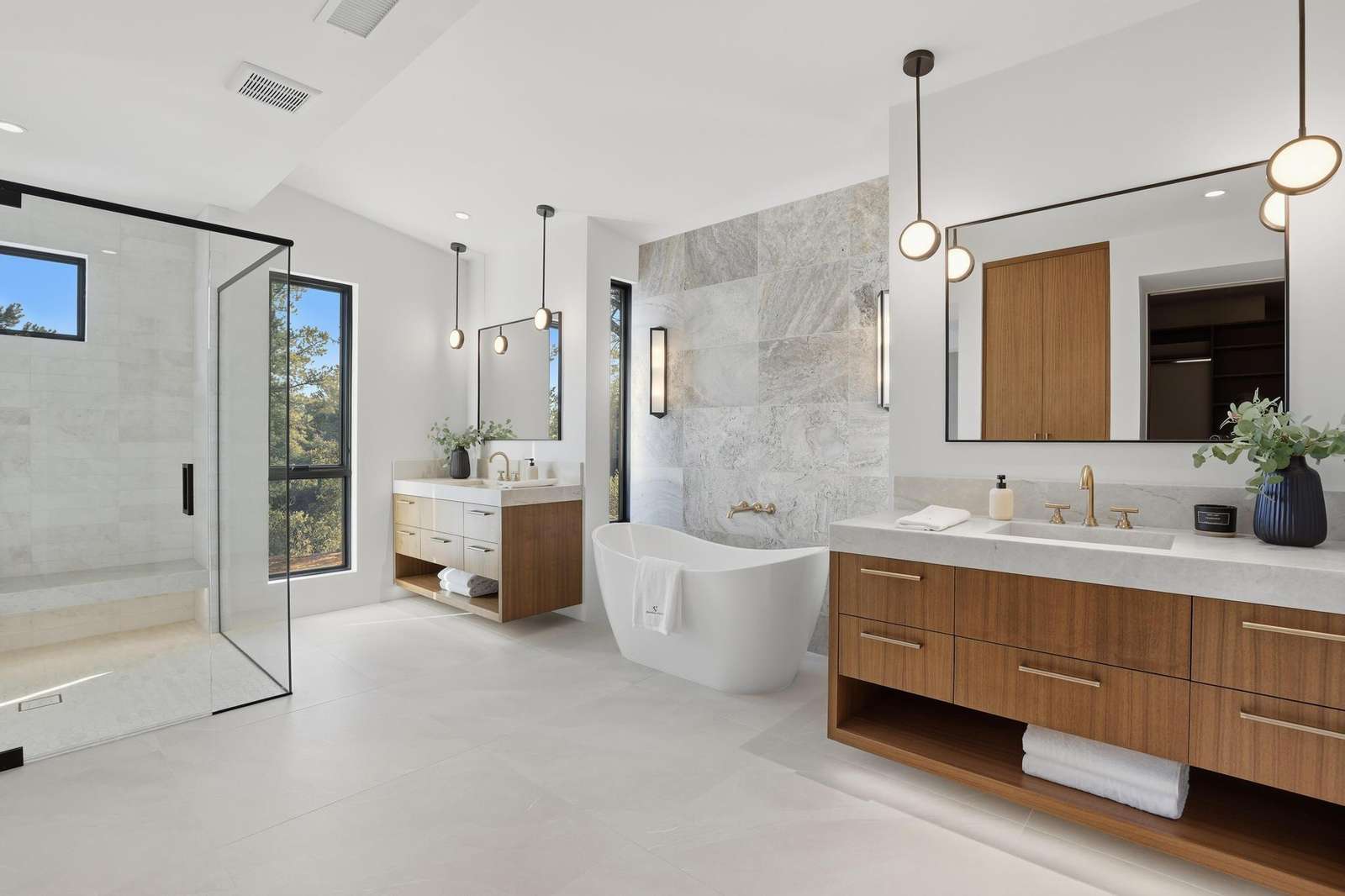 Spa-inspired bathroom with freestanding tub and walk-in shower