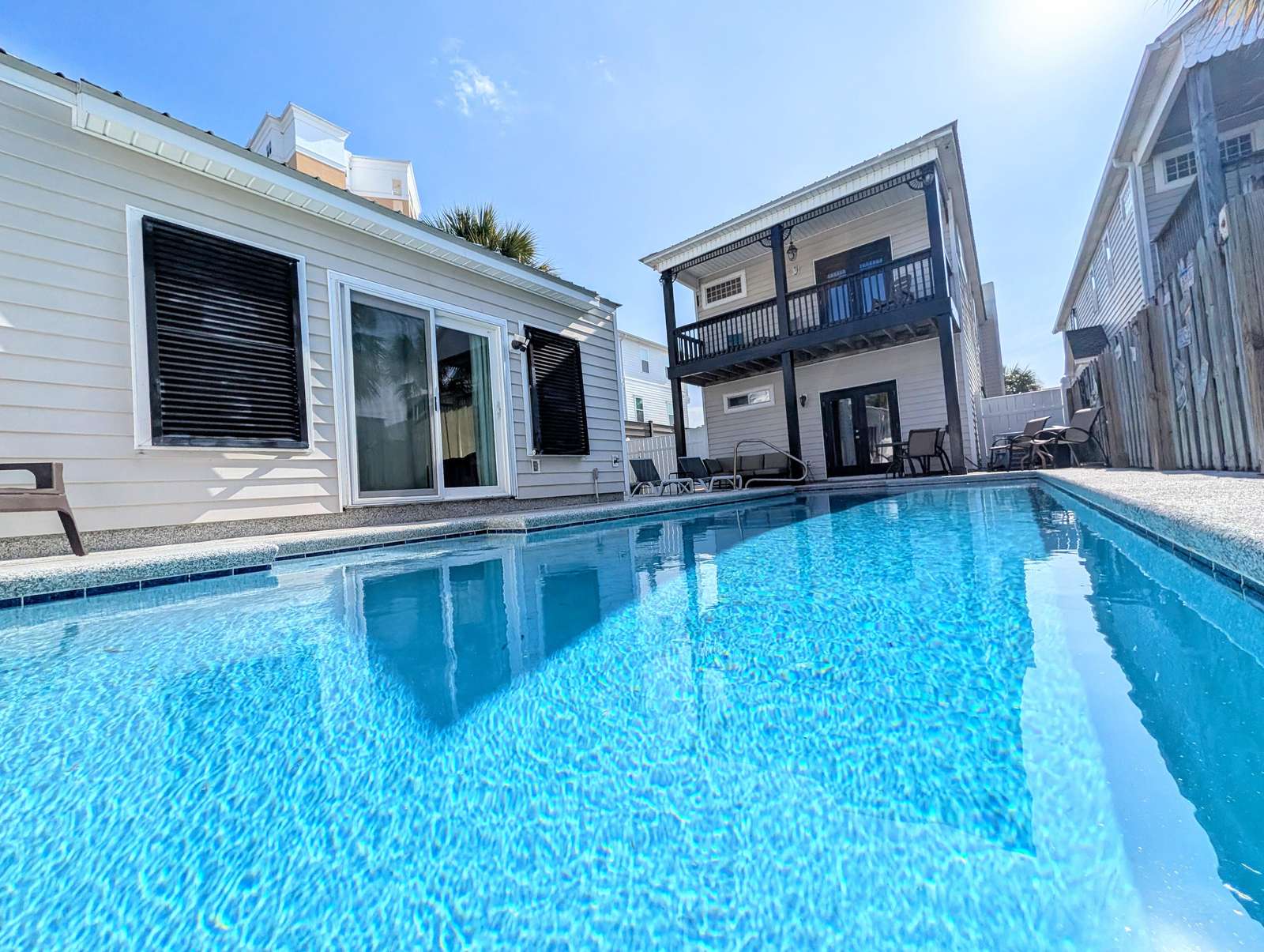 Private backyard pool with Pool Cabana and spacious pool deck - property