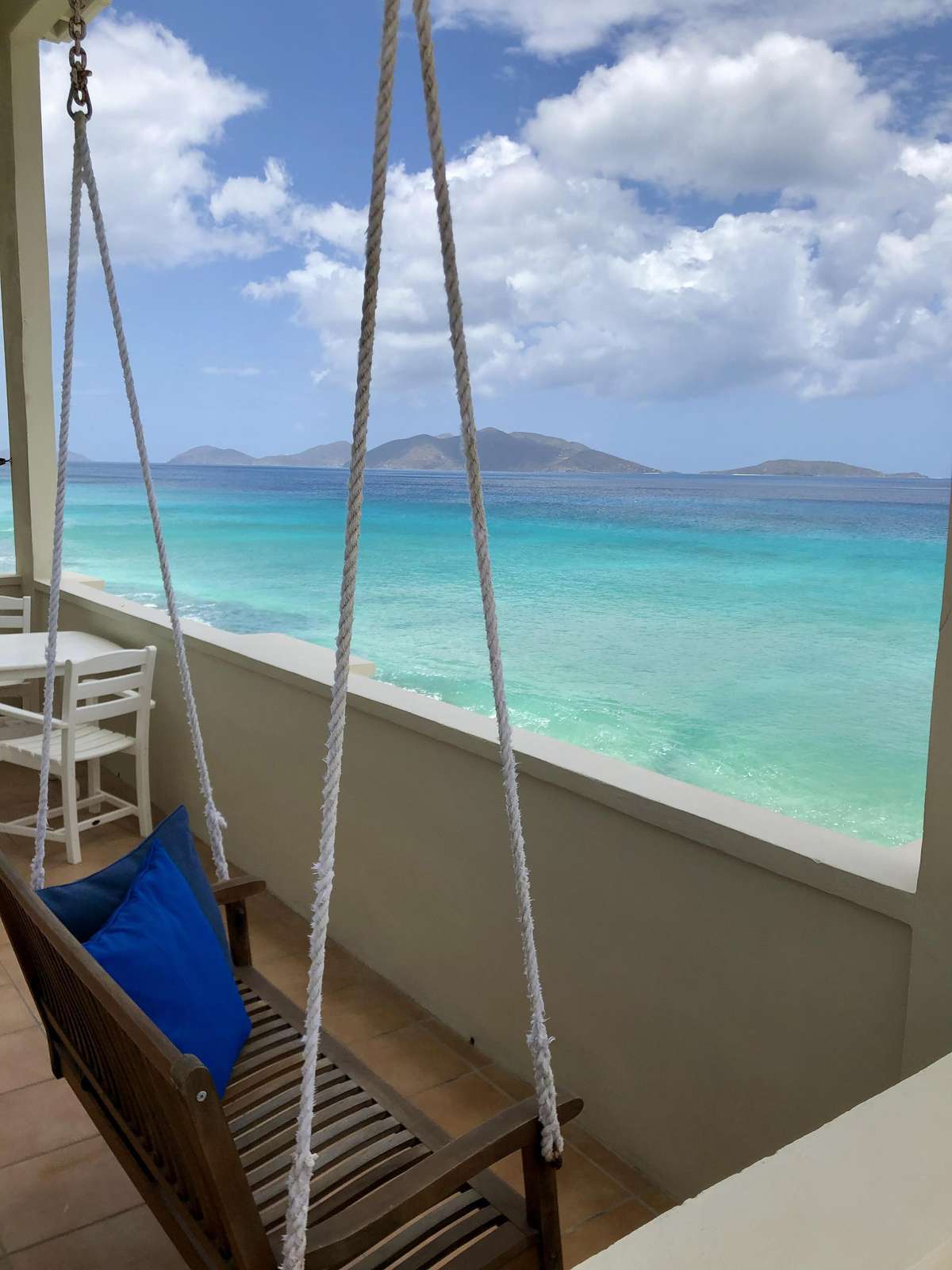 Balcony swing with stunning ocean views for ultimate relaxation
