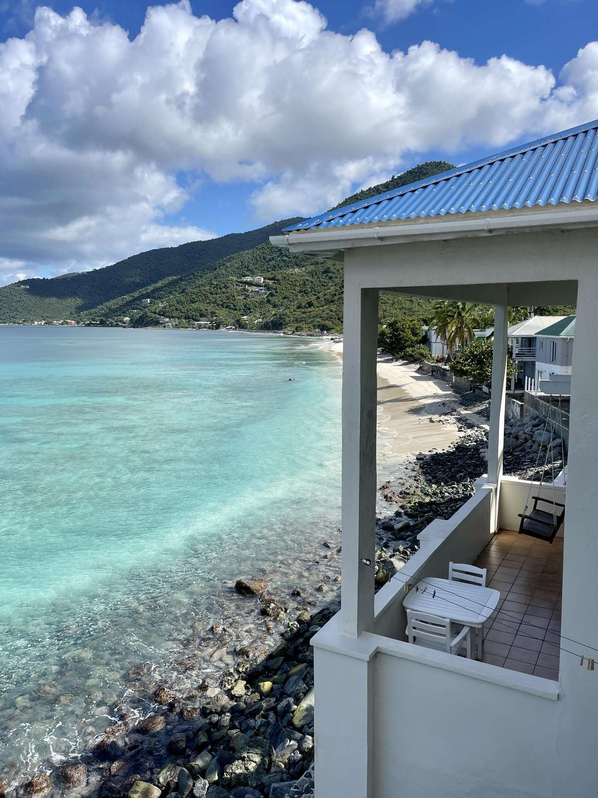 Cozy porch with stunning ocean and mountain views