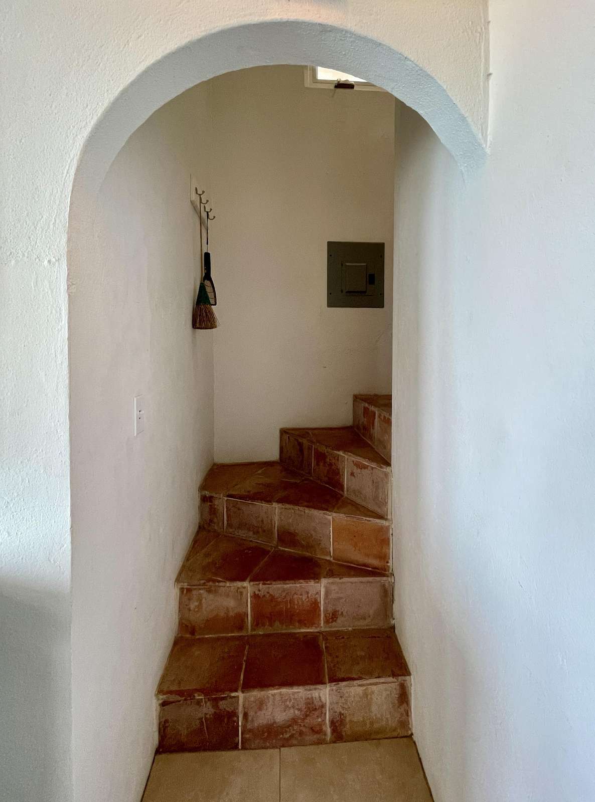 Charming tiled staircase with cozy, rustic charm
