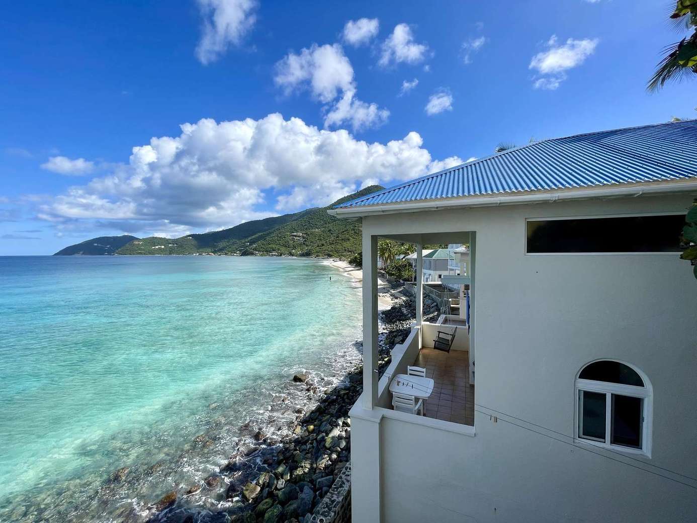 Oceanfront view from serene coastal retreat balcony
