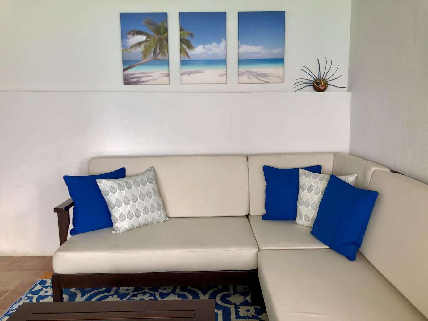 Cozy living room with plush seating and coastal decor