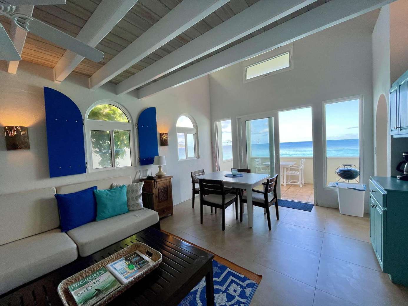 Bright living and dining area with stunning ocean views