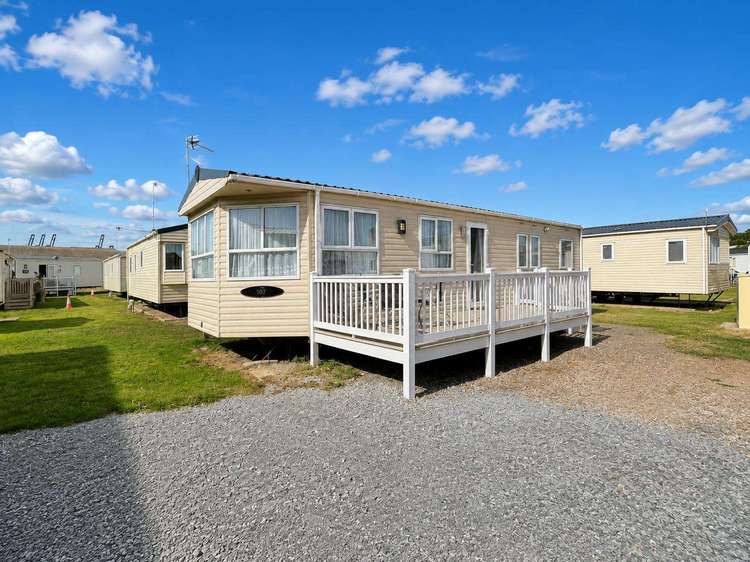 55012SW⭐ – SW area, 3 bed, 8 berth caravan with side decking, D/G and C/H. Ruby rated. Preview 0