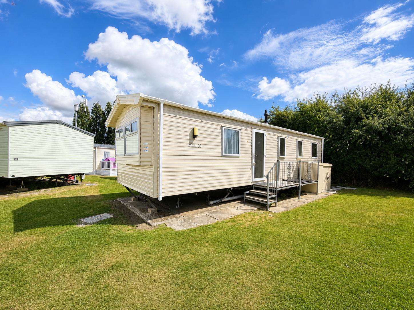 Enjoy a stay in this beautiful caravan which sleeps up to 6 people. The open plan living is perfect for relaxing all together on your break. - property