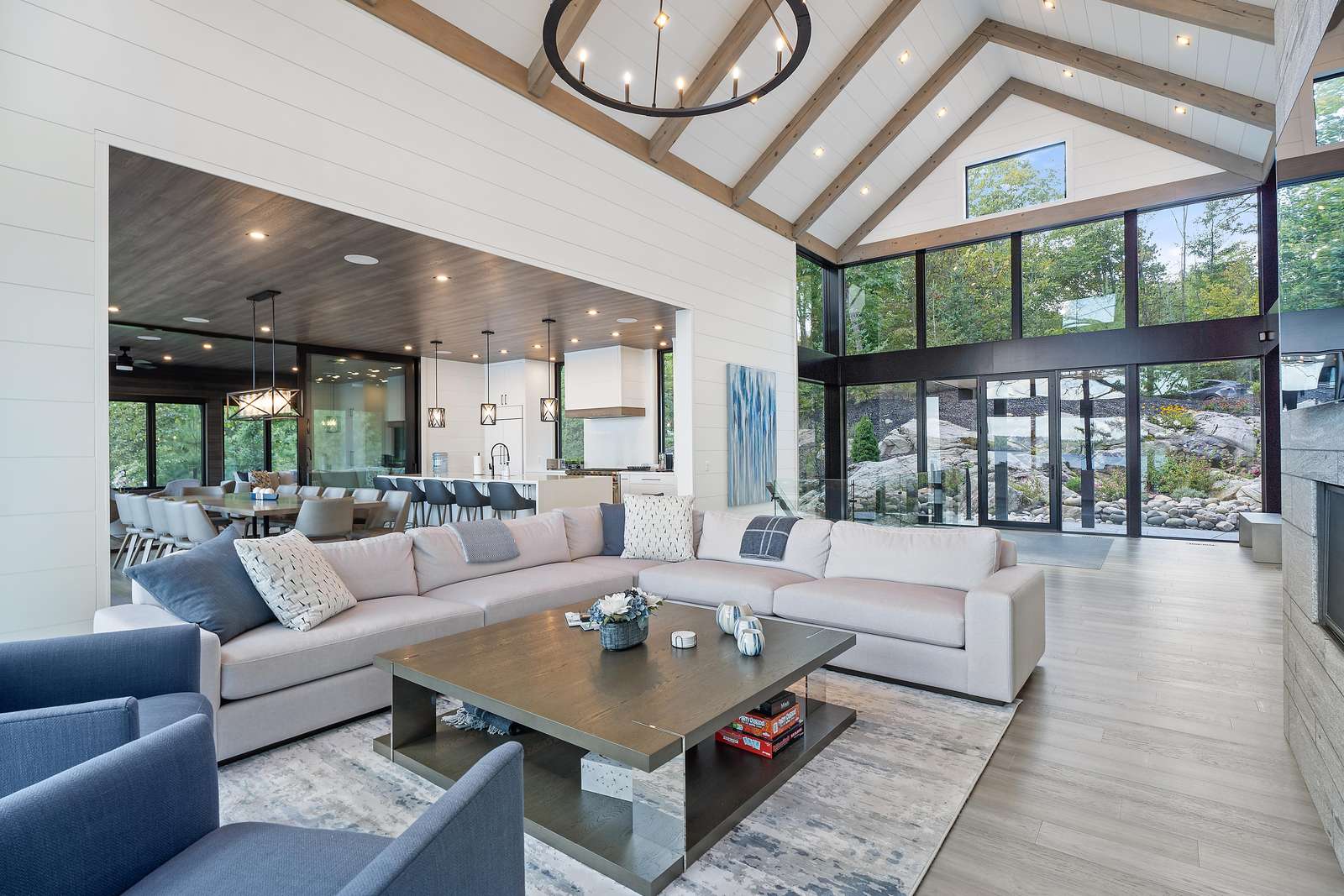 Spacious living room with soaring ceilings and panoramic windows