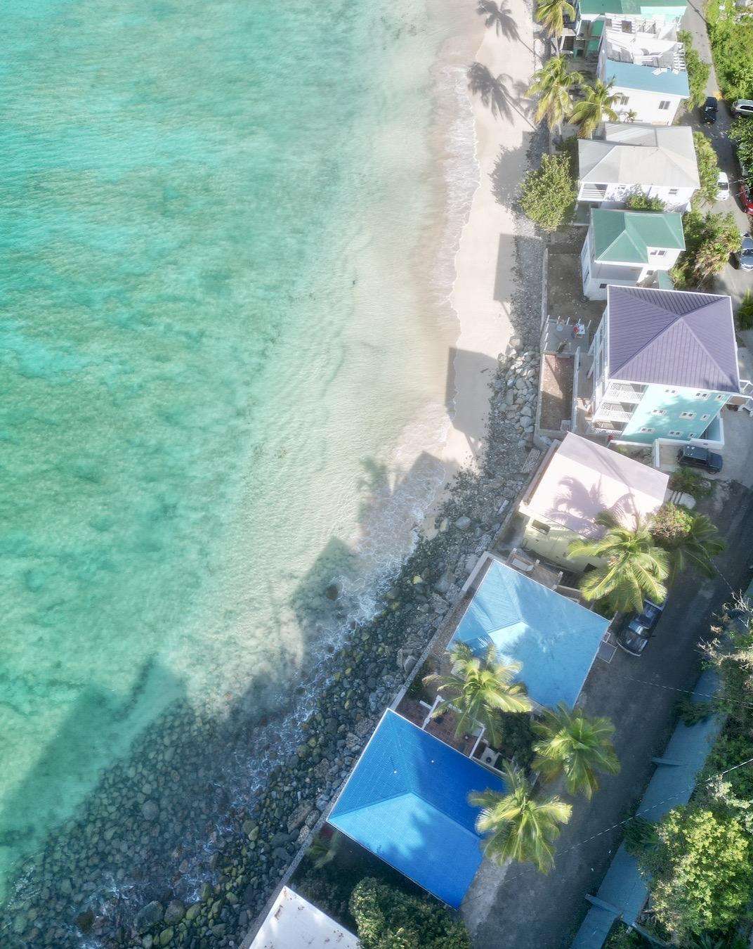 Oceanfront view with direct beach access and tropical vibes