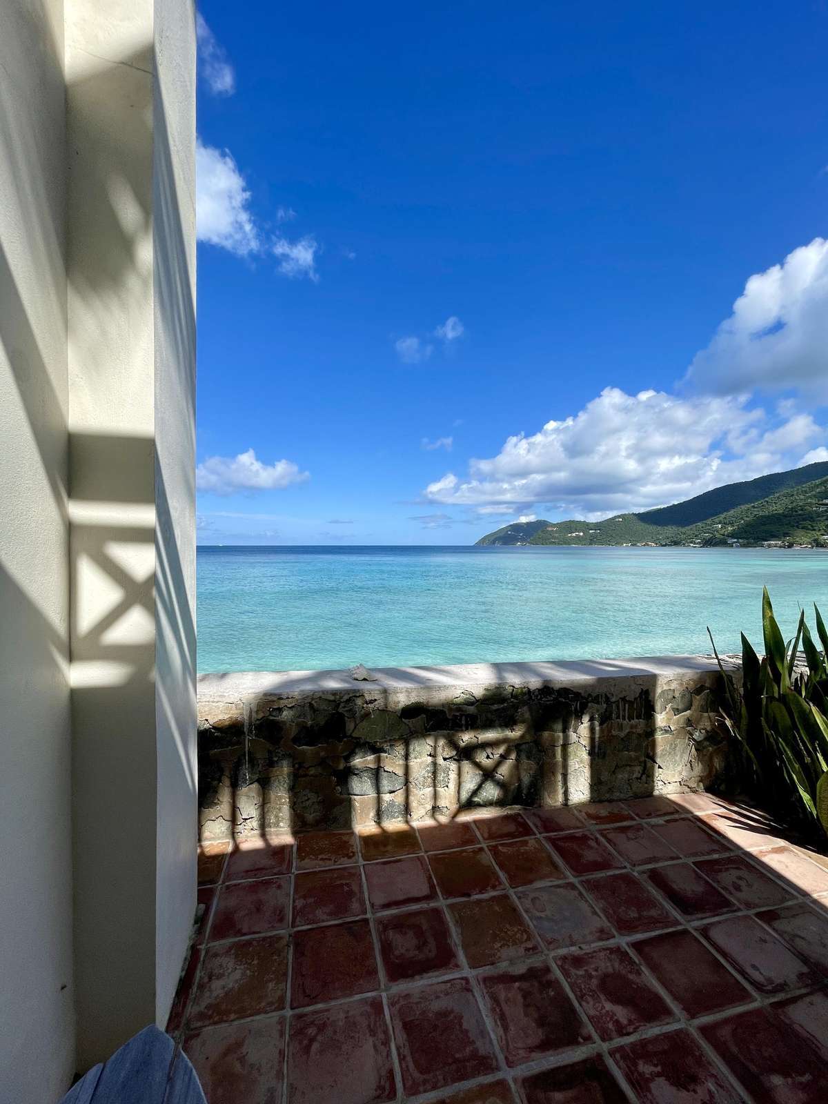 Oceanfront patio with stunning sea and mountain views