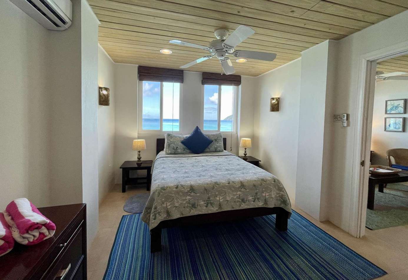 Cozy bedroom retreat with ocean views and natural light