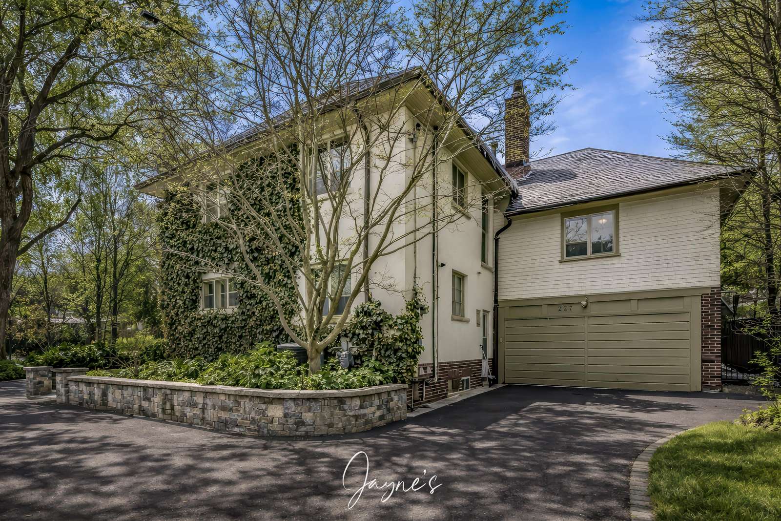 Urban home with lush garden Back Yard