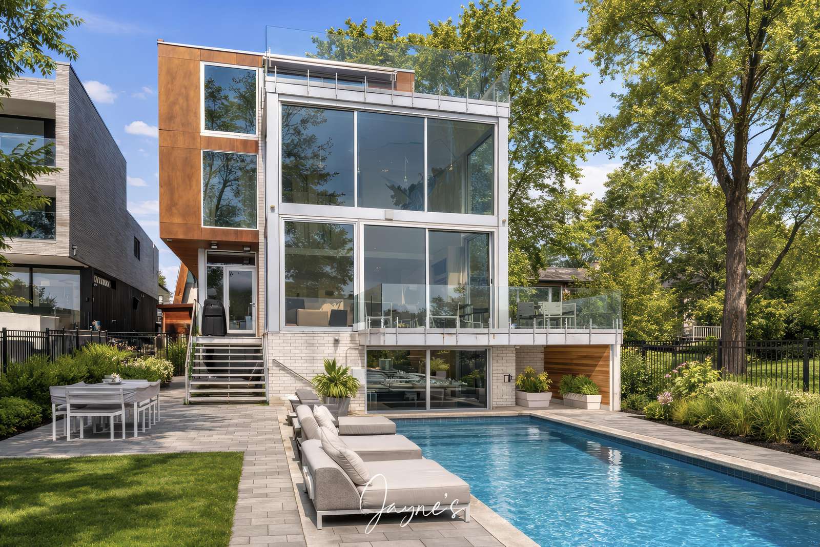 Modern home with floor-to-ceiling windows and private pool - property