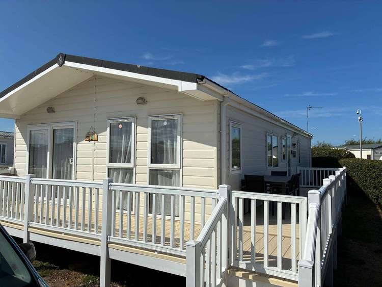 24003KC⭐ – Kinmel Court, 3 bed 6 berth lodge with decking, D/G and C/H. Platinum rated. Preview 1