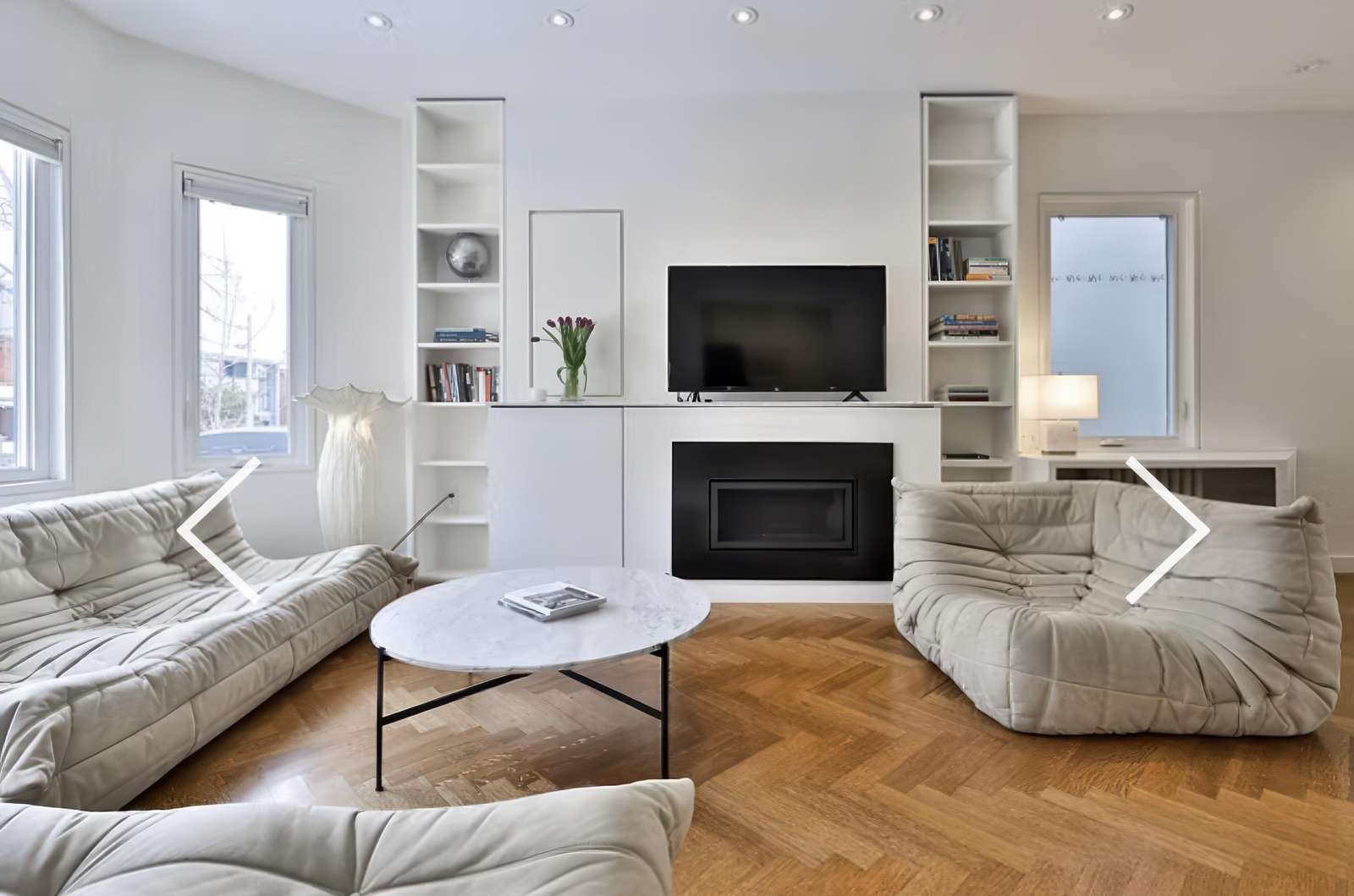 Bright and airy living room with cozy fireplace and modern decor