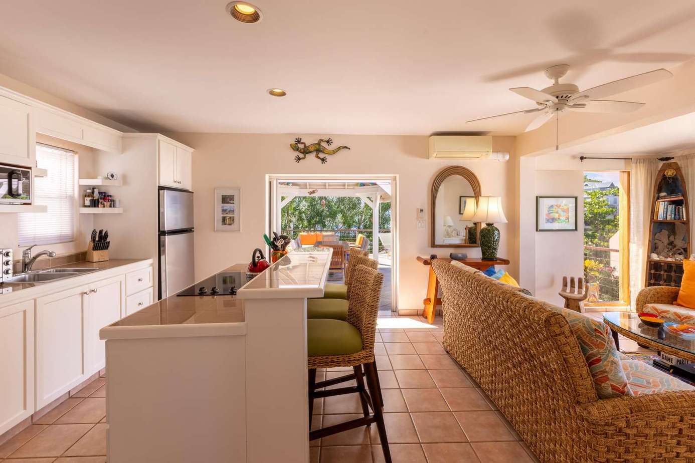 Bright open kitchen and cozy living area with garden views