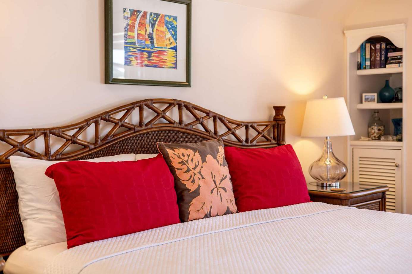 Cozy bedroom retreat with vibrant pillows and warm lighting
