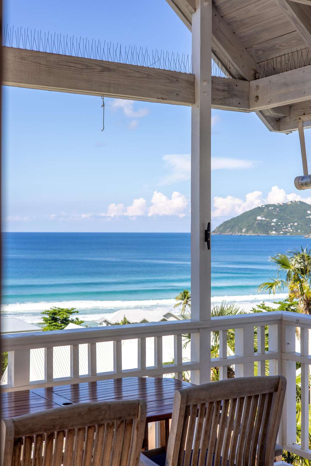 Oceanfront balcony with stunning sea and mountain views