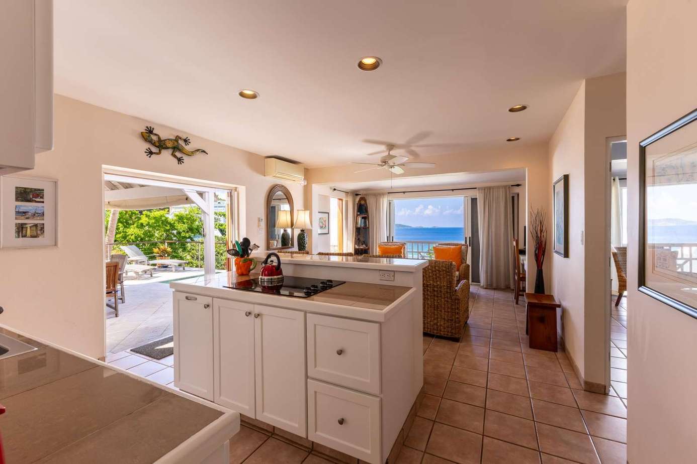 Spacious open kitchen and living area with ocean views