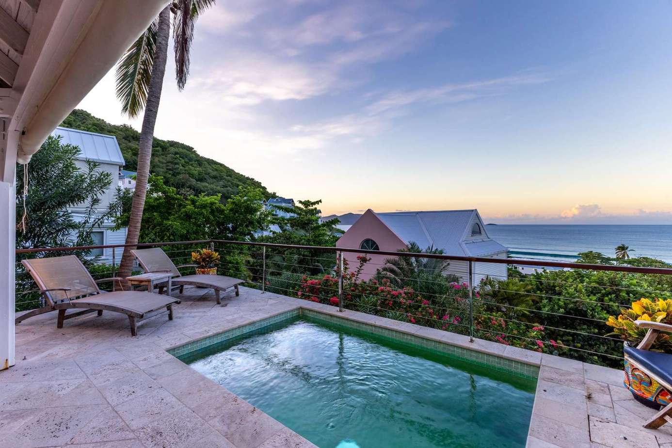 Private pool patio with ocean views and sunset lounge chairs