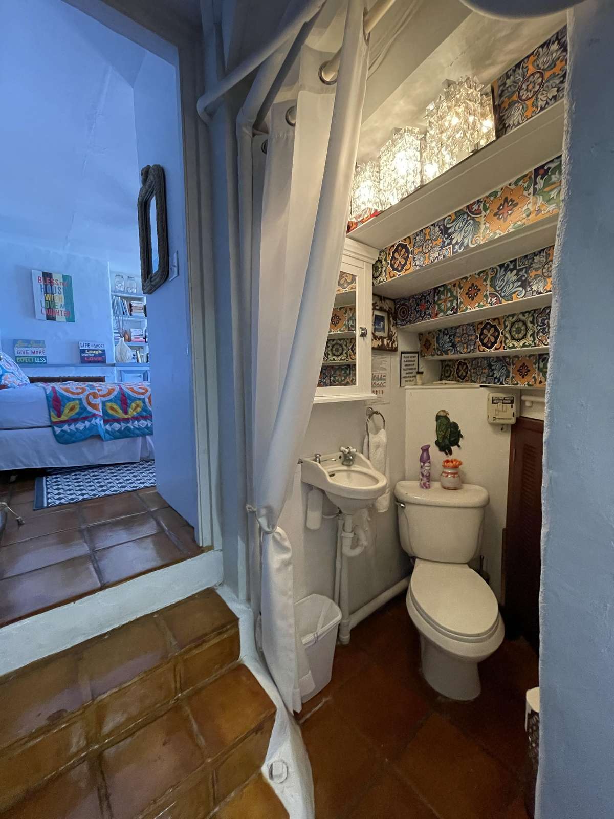 Cozy bathroom with charming rustic shelves and warm lighting
