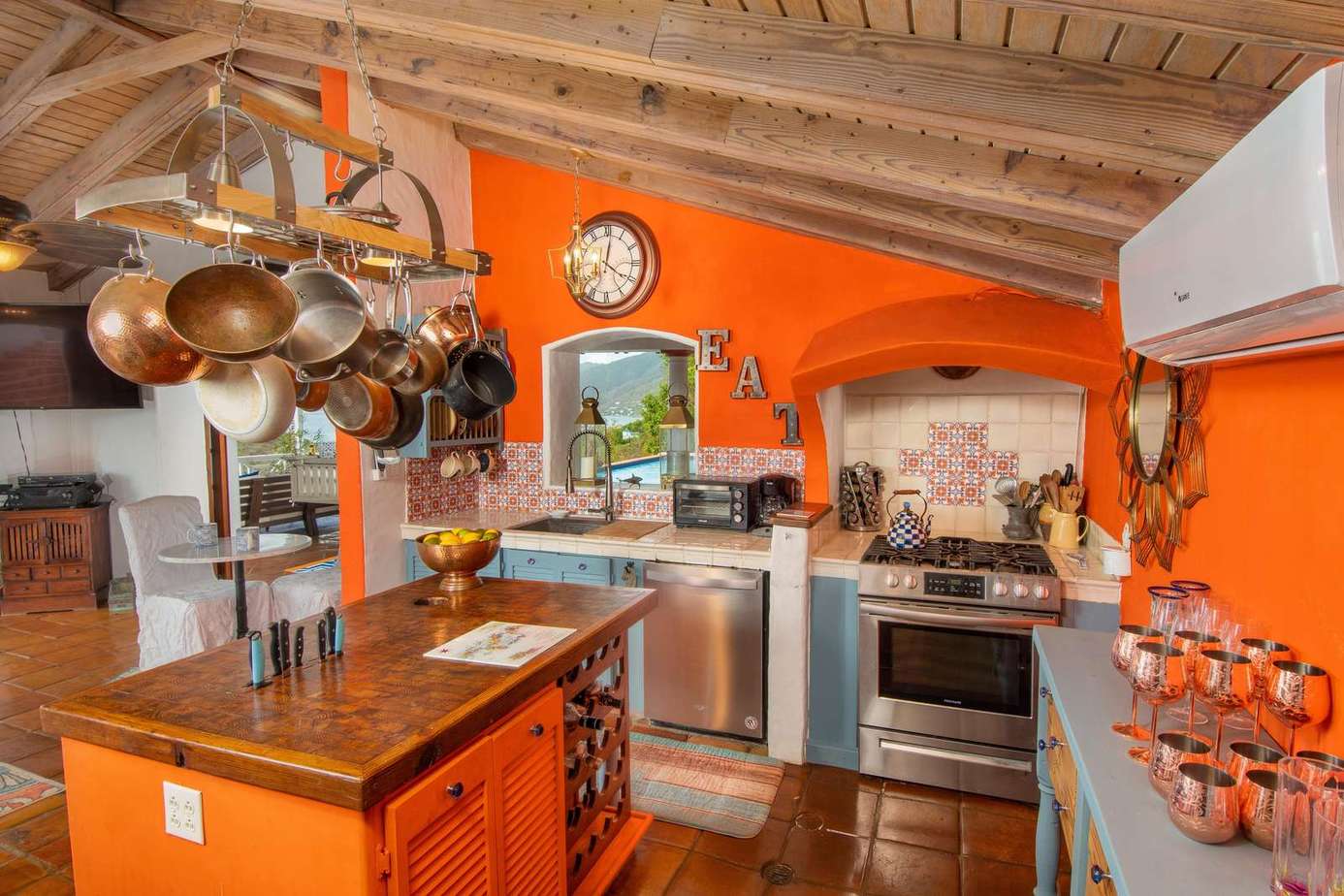 Vibrant kitchen with rustic charm and modern amenities
