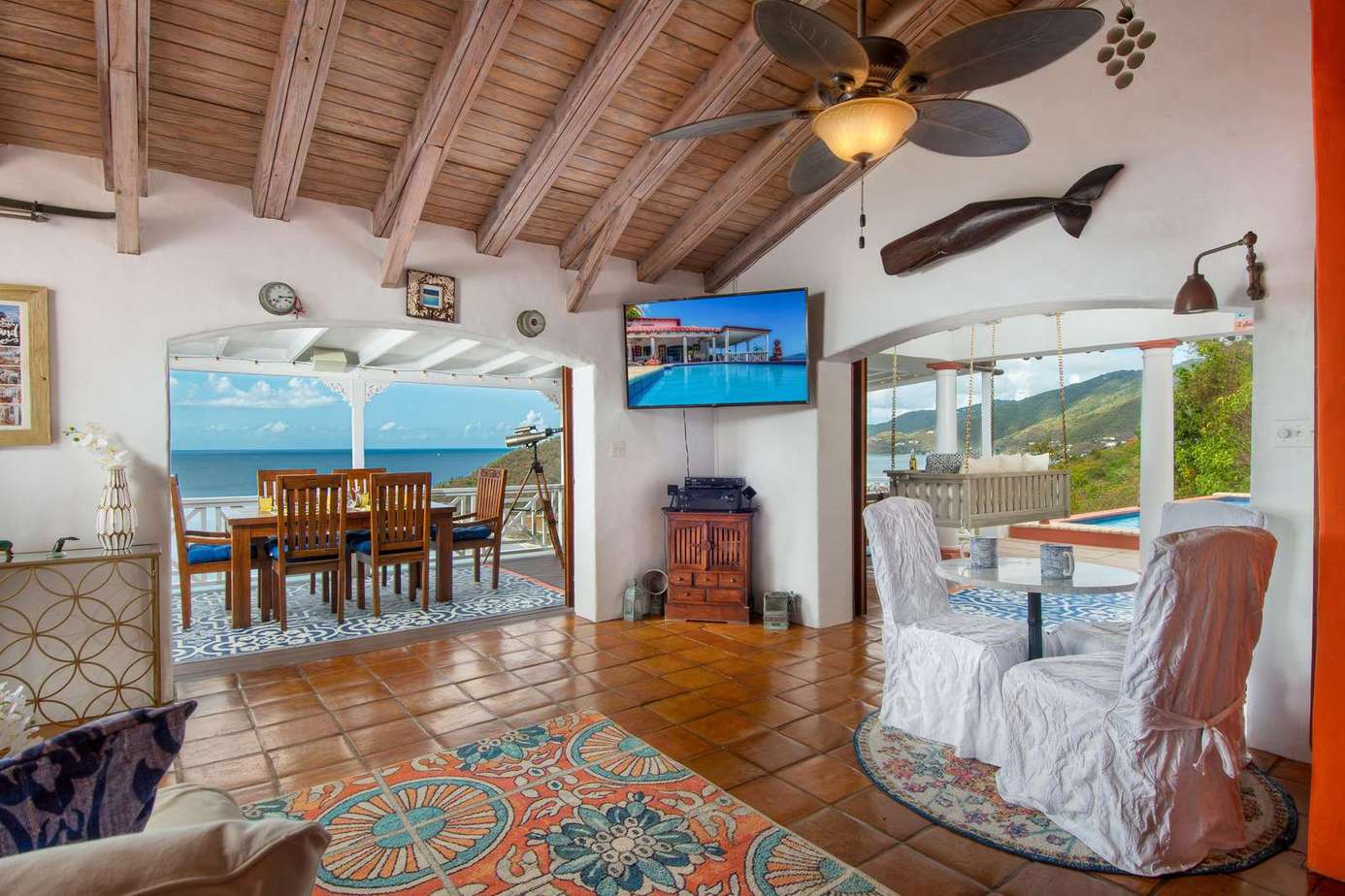 Cozy living room with ocean views and rustic charm