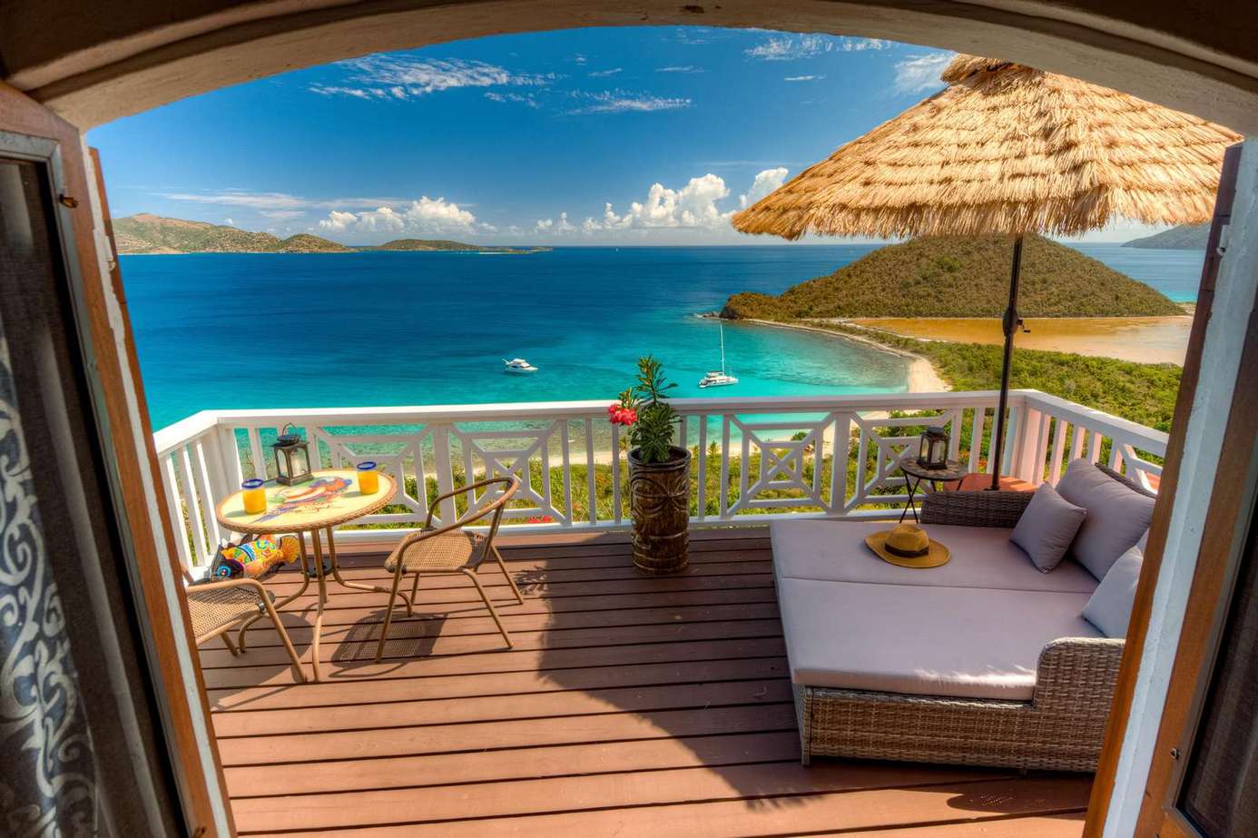Oceanfront deck with cozy seating and panoramic views
