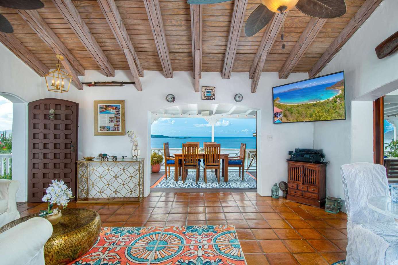 Charming living room with rustic beams and ocean views