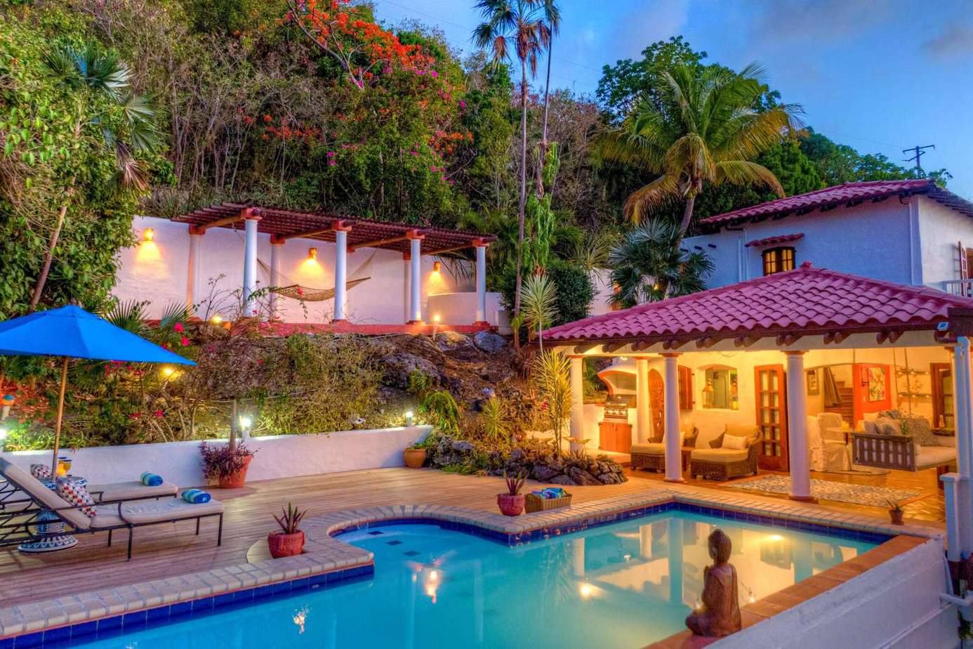 Secluded poolside retreat with cozy outdoor lounge area