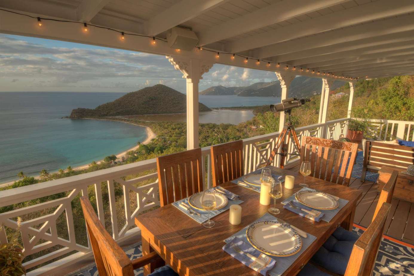 Oceanfront dining patio with stunning sunset views