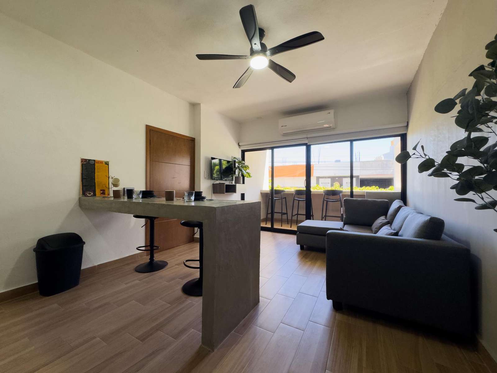 Bright living room with scenic views and modern comfort - property