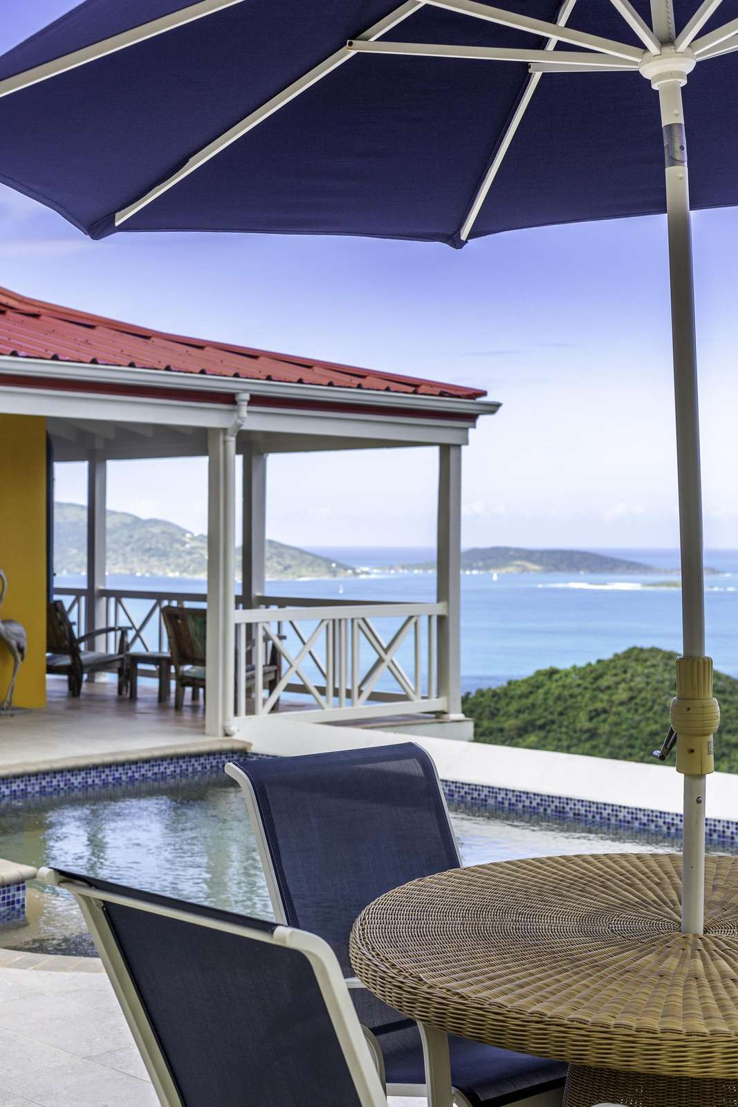 Cozy outdoor patio with stunning ocean views and shade