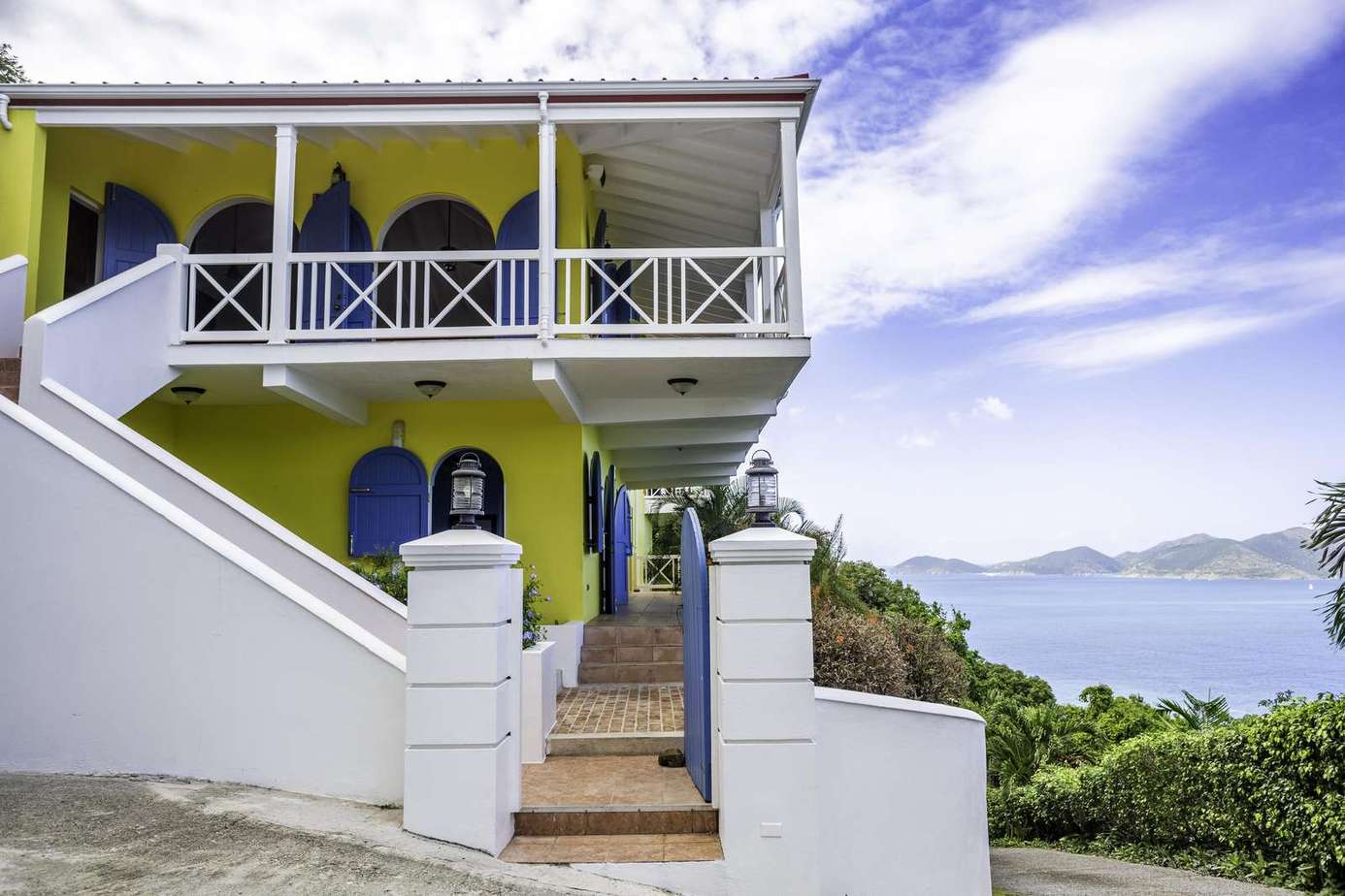 Bright balcony with stunning ocean views and vibrant charm